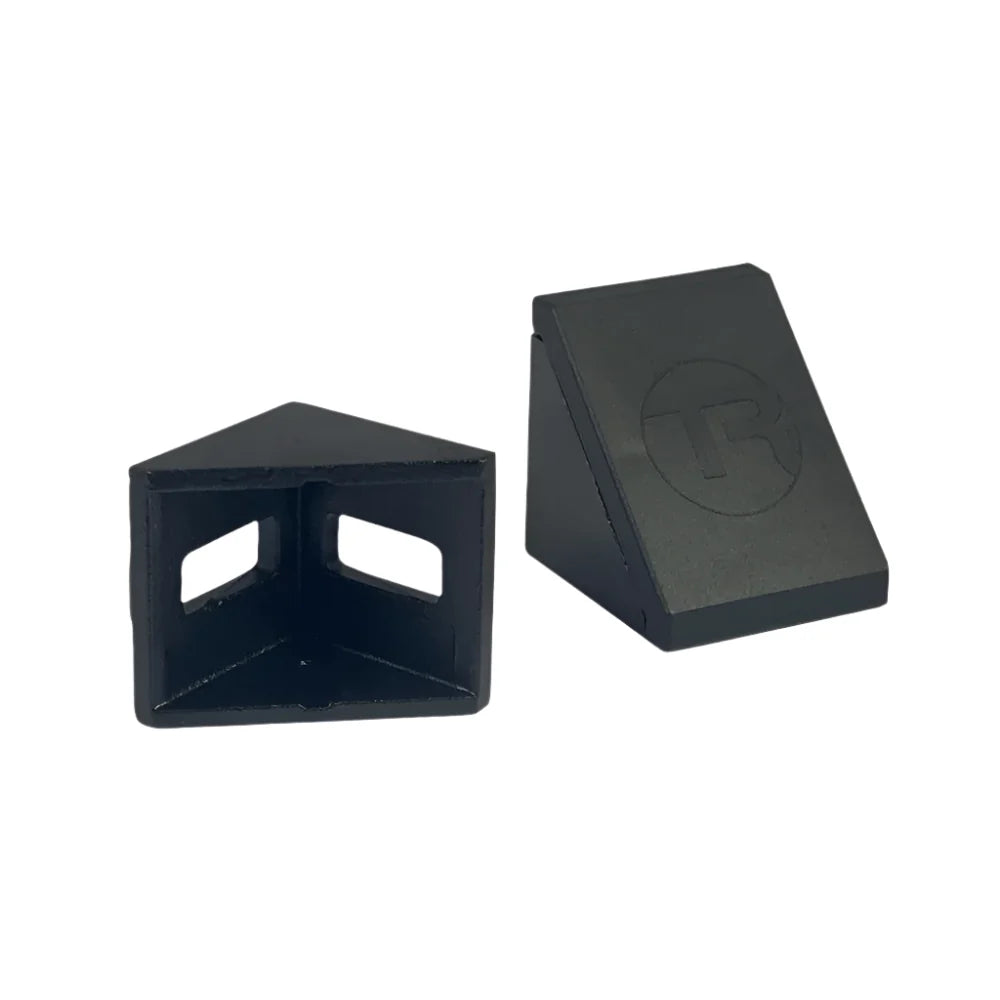 Trak Racer 40mm corner bracket, front angle — triangular aluminium bracket showing slot mounting holes