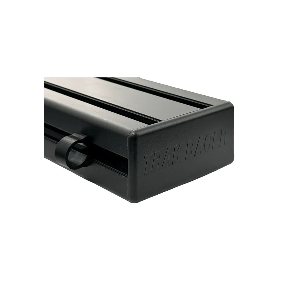 Trak Racer cable management clip, mounted on T-slot profile corner — clips onto 8mm slot