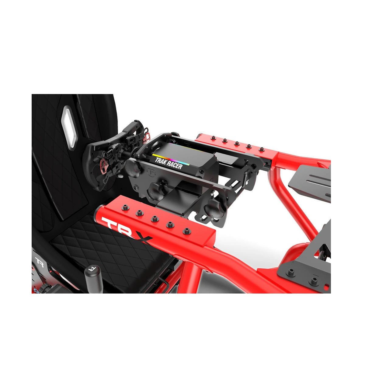 Trak Racer Alpine Racing TRX V2 cockpit, Tifosi red, close-up detail — wheel deck mount and TRX badge