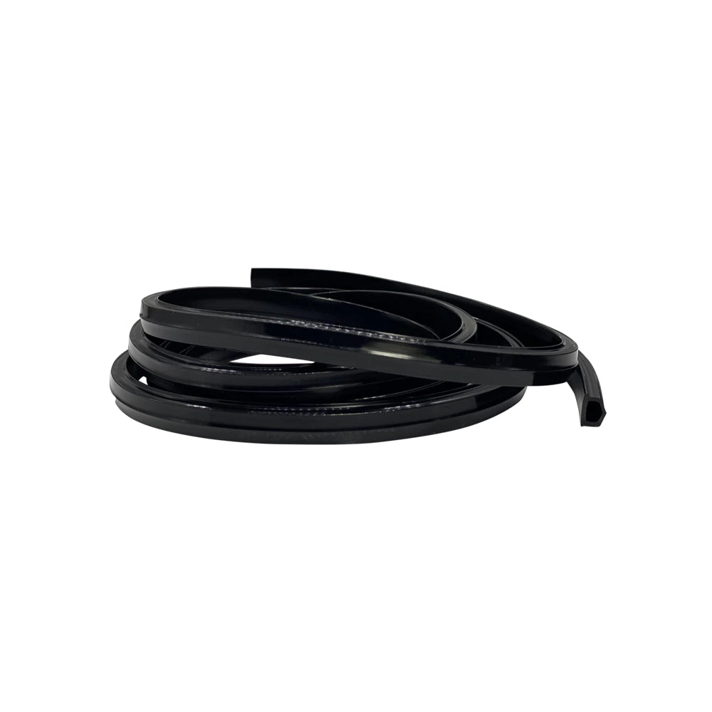 Trak Racer Rubber Strip in black, coiled to show the U-channel profile