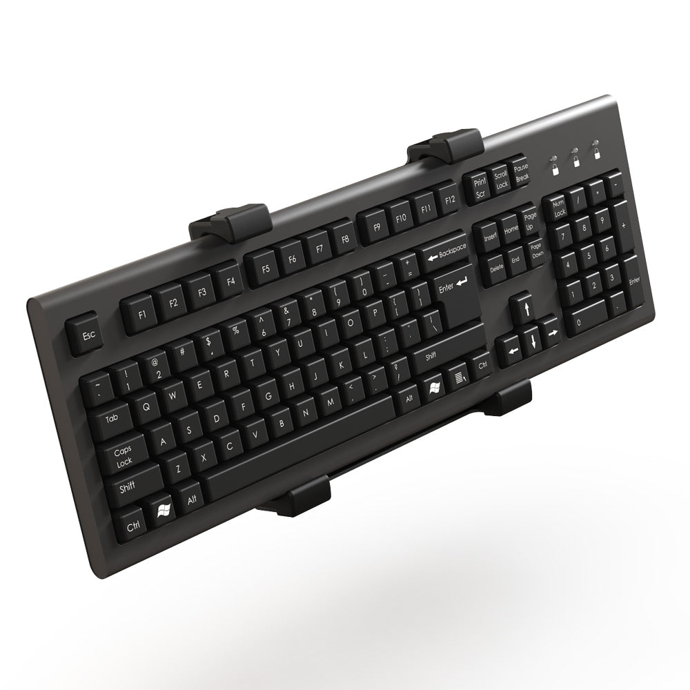 Virpil VPC Keyboard Mount Adapter holding a full-size keyboard, secured at the corners by the four adjustable clips.