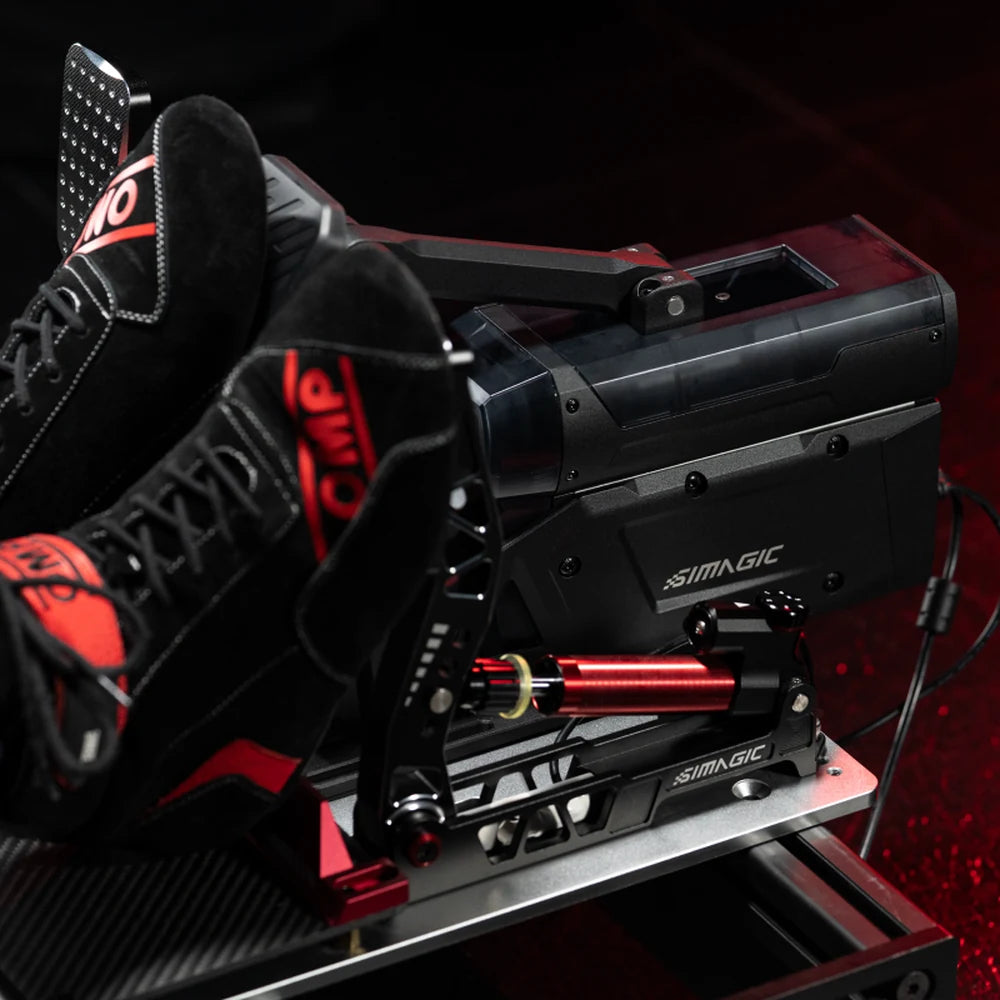 Simagic P-Active active pedal fitted as the brake in a sim rig, side view with a racing boot on the pedal