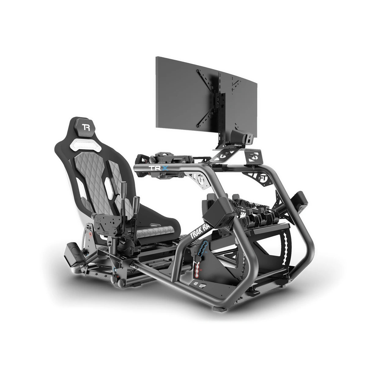 Trak Racer Alpine Racing TRX cockpit fitted with speaker mounts, front three-quarter view with ultrawide monitor