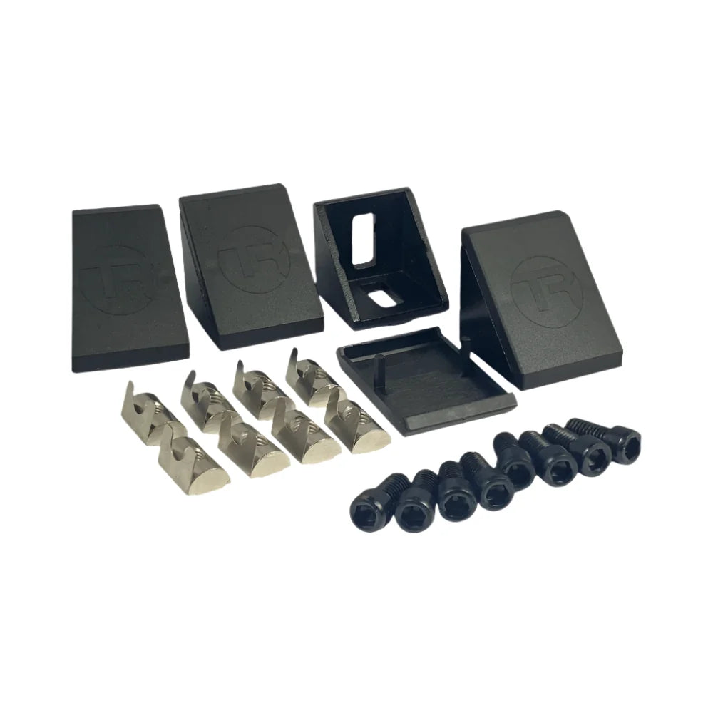 Trak Racer 40mm corner bracket kit — 4 brackets, ABS caps, T-nuts and mounting screws, full parts spread