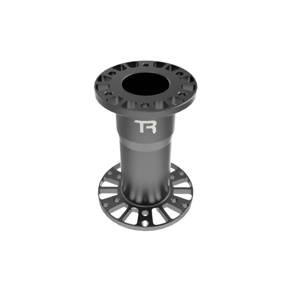 Trak Racer steering wheel hub spacer, front view — anodised matte black finish, bolt-hole flanges