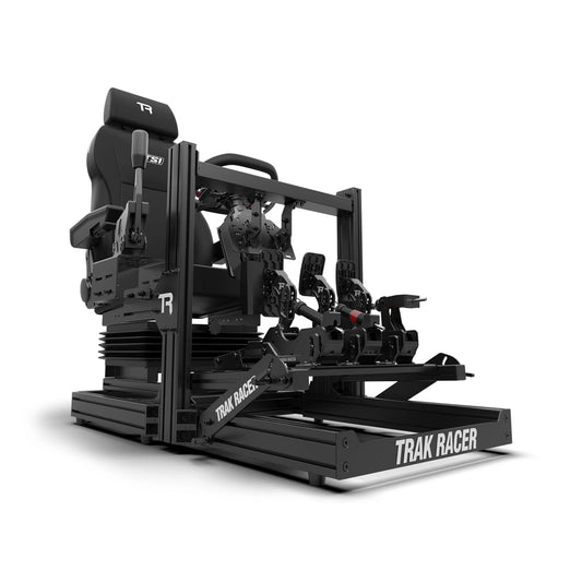 Trak Racer TRK Truck Driving Simulator, three-quarter view of the TS1 suspension truck seat, hybrid pedals and 80x40mm aluminium frame