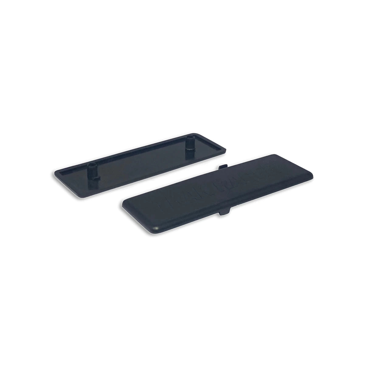 Trak Racer 120x40mm profile end caps, pack of two showing logo face and push-fit pegs