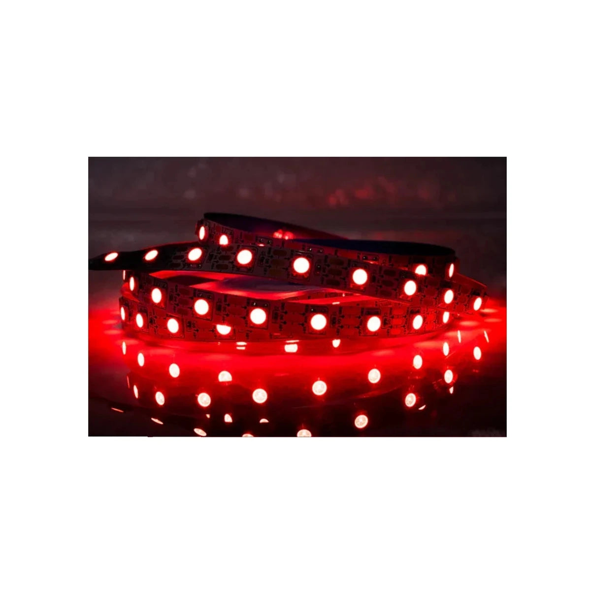 Trak Racer LED strip light lit in red, glowing strip against a dark background