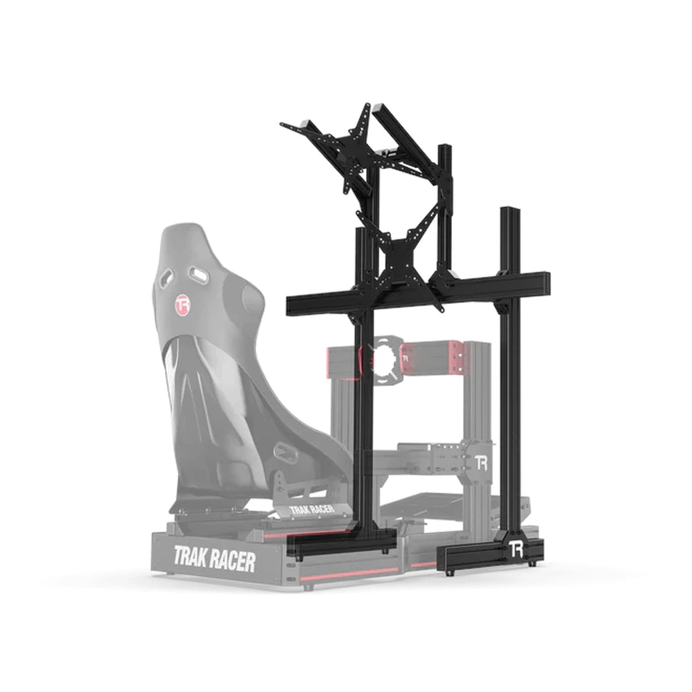 Trak Racer large freestanding dual monitor stand shown beside a Trak Racer seat for scale, front-quarter view