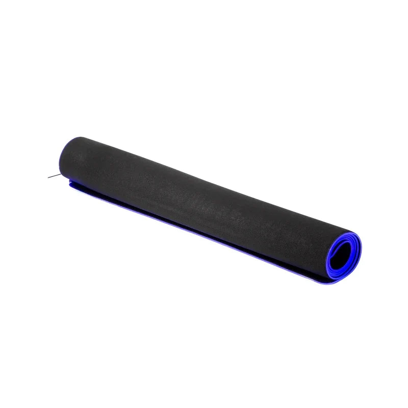 Trak Racer premium RGB floor mat, fully rolled with blue LED trim glowing along the edge