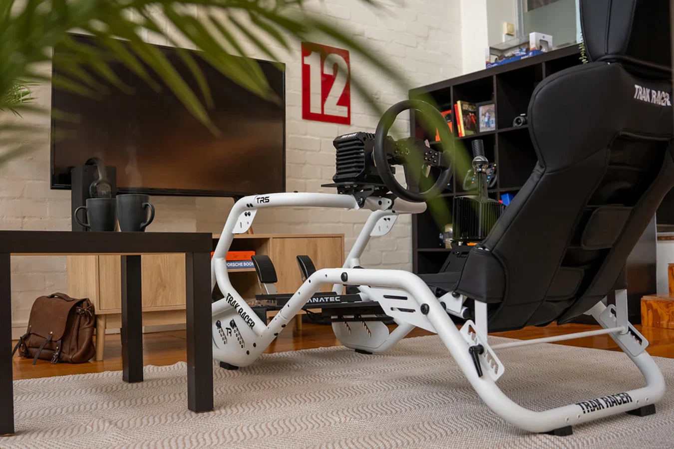 Trak Racer TR5 Hybrid Racing Simulator set up in a home sim racing room