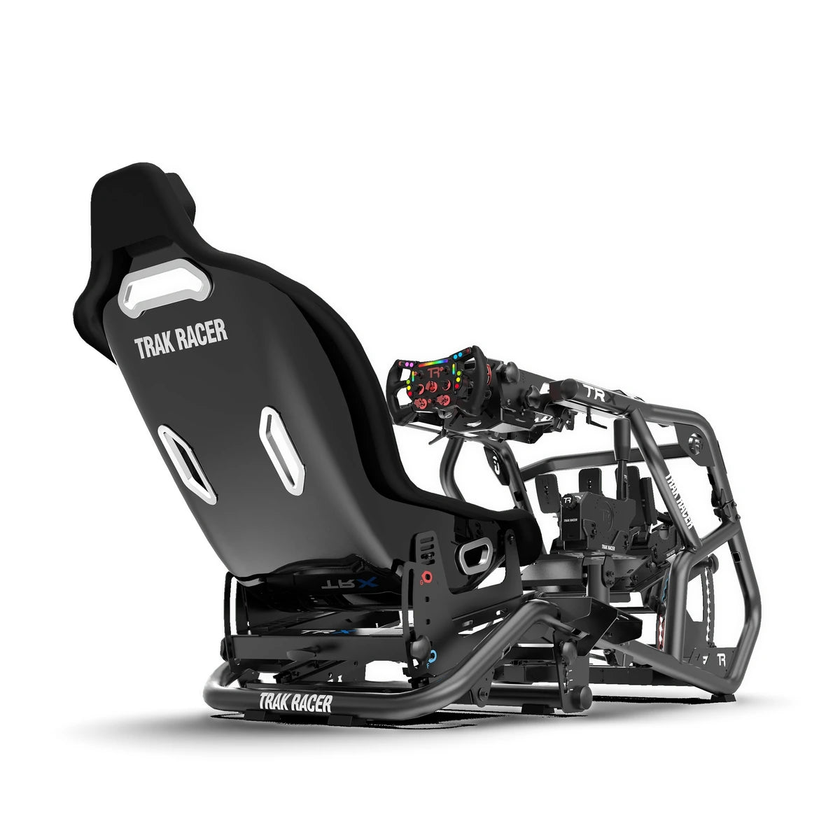 Trak Racer TRX V2 sim racing cockpit, rear three-quarter view — seat, three-pedal set and handbrake mount