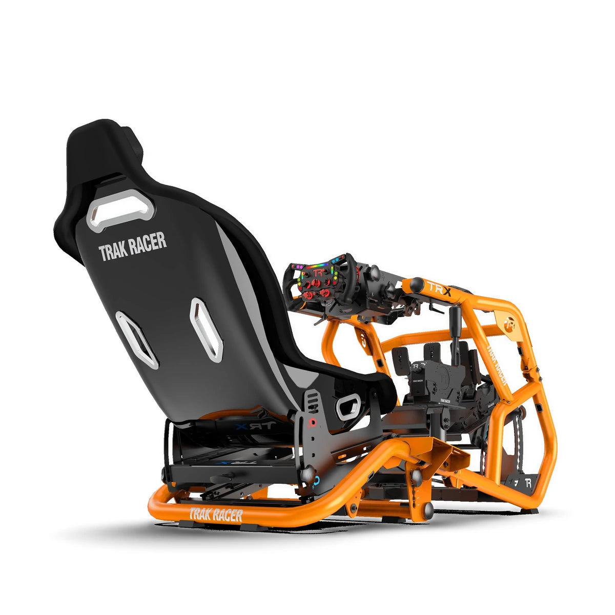 Trak Racer Alpine Racing TRX V2 sim cockpit, sunset orange, driver's-side three-quarter view with wheel and shifter