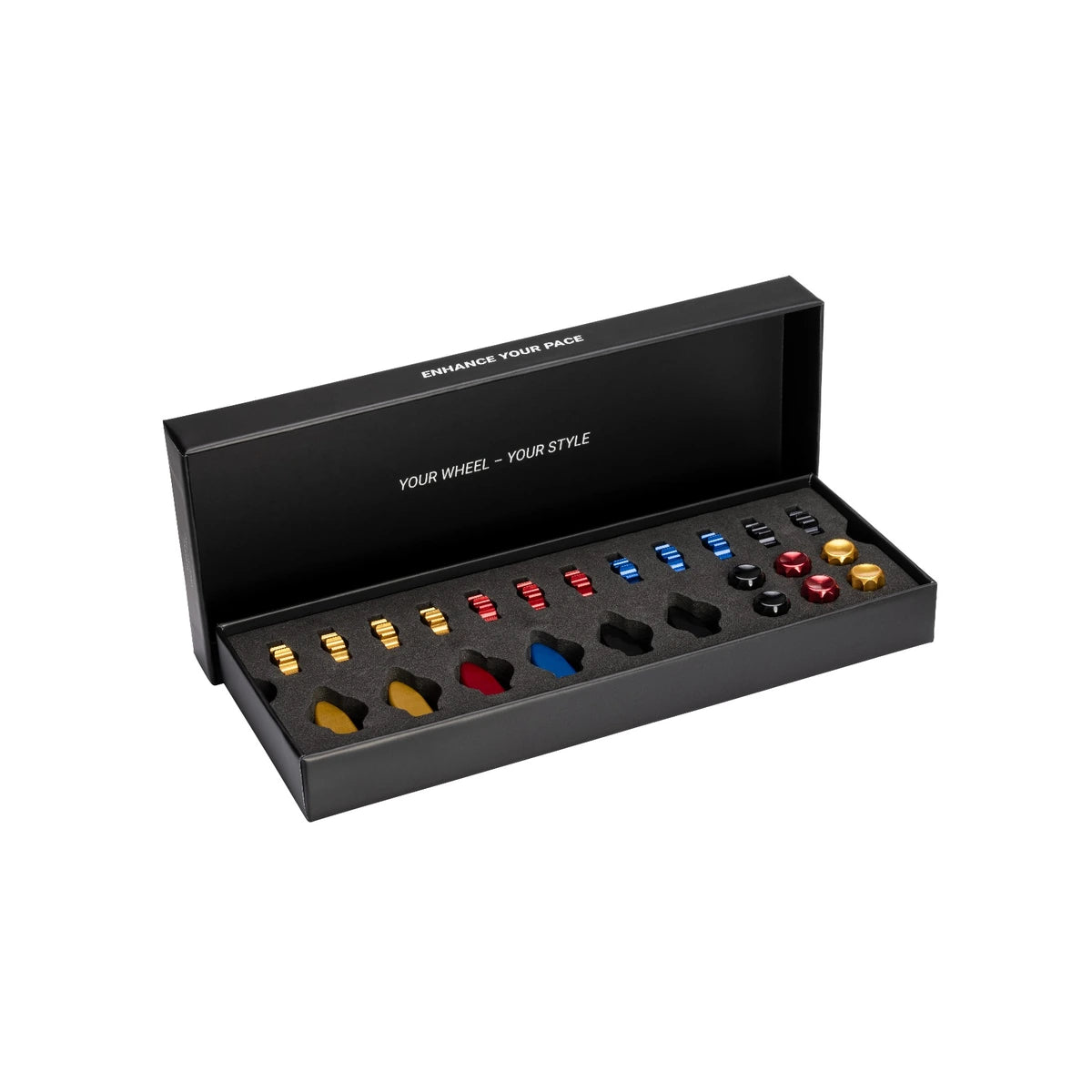 Ascher Racing Knob Kit Pro in its presentation box with gold, red, blue and black aluminium knobs